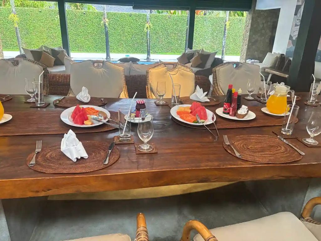 Breakfast served at the dining table of a Bali villa