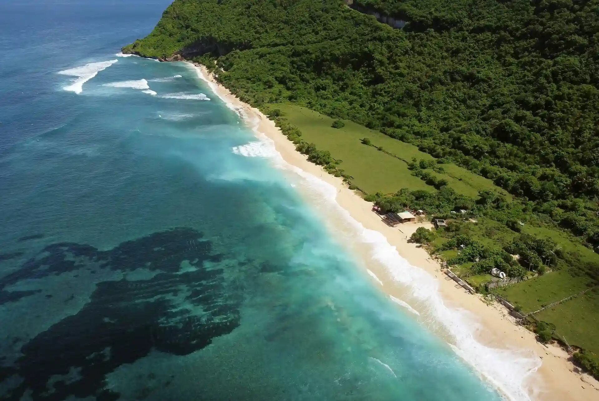 Aerial view of Nyang Nyang Beach and turquoise water, Uluwatu